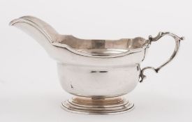 A George V silver pedestal sauce boat, maker J S Harman, London,