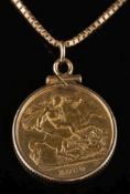 A half sovereign dated '1910' and mounted on fine-link chain: stamped '14K', 8.5gms gross weight.