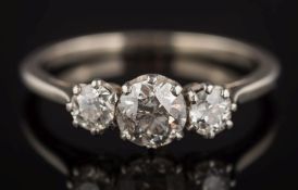 A diamond three-stone ring: with diamonds approximately 0.25ct, 0.70ct and 0.