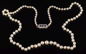 A cultured pearl,