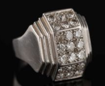 A gentleman's Art Deco diamond mounted cluster ring: of tri-panelled section,