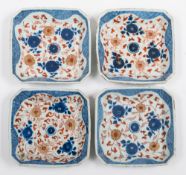 A set of four Chinese Imari square section dishes: painted in underglaze blue,