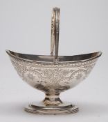 A Victorian silver swing handled sugar basket, maker Charles Stuart Harris, London,