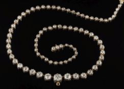 A late 19th century graduated diamond riviere necklace: with circular,