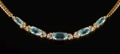 An 18ct gold, aquamarine and diamond necklace: with five graduated,