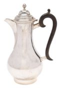 An Edward VII silver hot water jug, maker Carrington & Co, London,