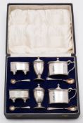 A matched six-piece condiment set, various makers and dates: of oval outline with reeded borders,