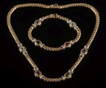 A 9ct gold and coloured gemstone, curb-link necklace and matching bracelet: each with four various,
