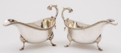 A pair of George V silver gravy boats, maker Henry & Arthur Vander, London,