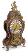 A large boulle cased mantel clock: the eight-day duration movement striking the hours and