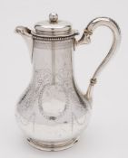 A Victorian silver hot water jug, maker Arthur Sibley,