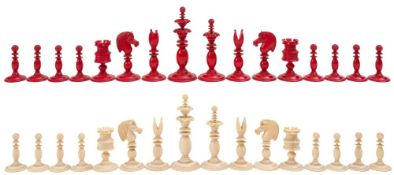 A 19th century ivory Calvert pattern chess set: one side stained red, the other side left natural,