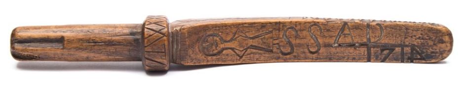 An 18th century treen 'goose wing' sheath: with female figure and dated 1714 to one side and