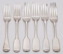 Six George III and Victorian fiddle pattern table forks, various makers and dates: crested,