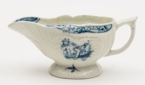 A small Lowestoft blue and white butterboat: of strap fluted silver shape,
