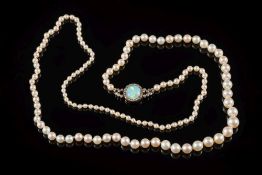 A cultured pearl single-string necklace: with 132 pearls graduated from 4mm diameter to 8mm