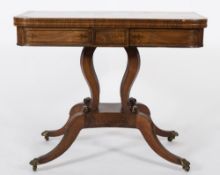 A Regency rosewood and brass inlaid rectangular card table:,