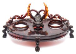 A 19th century Italian tortoiseshell desk stand: of oval outline,