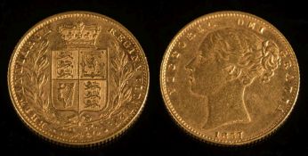 A Victorian sovereign dated '1857':.
