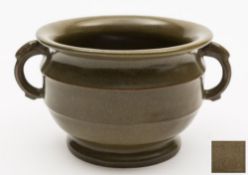 A Chinese tea-dust glazed two-handled censer: of ribbed baluster form,