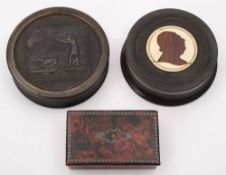 A 19th century pressed horn snuff box: of circular outline,