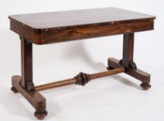 An early Victorian rosewood rectangular library table:, the top with rounded corners,