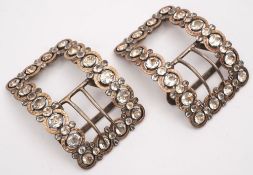 A pair of 19th century polished steel and paste set buckles: of rectangular outline 7.5cm. wide.