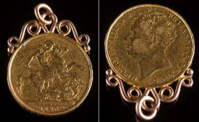 A George IV (1820-30) gold two pound/double sovereign: 1823 mounted as a pendant.