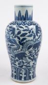 A Chinese blue and white vase: of baluster form with cylindrical neck,