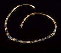An 18ct gold, sapphire and diamond collar necklace: with baguette-cut sapphires small circular,