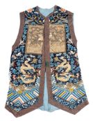 A 19th century Chinese embroidered sleeveless jacket: the back panel with bullion embroidered