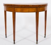 An early 19th Century satinwood and inlaid half round card table:, crossbanded in tulipwood,