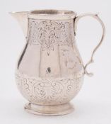 A George II silver cream jug, maker WS, London,