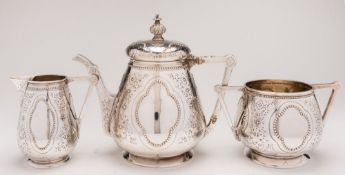 A Victorian silver three-piece tea service, maker Stephen Smith, London,