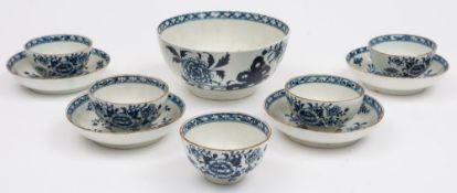 A set of four Lowestoft blue and white teabowls and saucers,