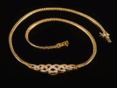 An 18ct gold and diamond entrelac design necklace: 40cm long, 21.5gms gross weight.