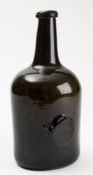 An 18th century sealed wine bottle dated 1794: of squat cylinder form, the applied seal titled 'H.