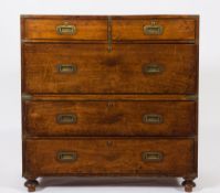 A 19th Century teak and brass bound military chest: in two parts,