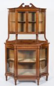 An Edwardian mahogany and marquetry display cabinet:, banded in satinwood,