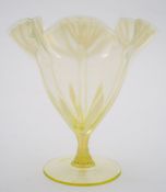 A 'vaseline' glass vase by Harry Powell for Whitefriars: the yellow tinged body with foliate