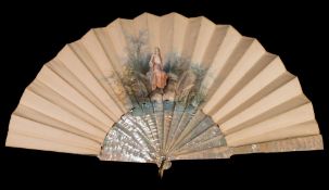 A late 19th century mother-of-pearl fan : the hand painted silk leaf depicting a young seated woman