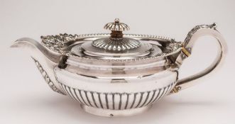A George III silver circular teapot, maker W.