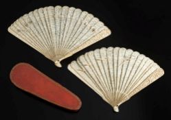 A 19th century Cantonese carved ivory brise fan: carved to both sides with figures in a pagoda