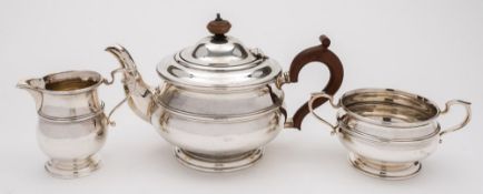 A George V silver three-piece tea service, maker Brook & Sons, Sheffield,