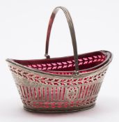 A Victorian silver swing handle basket, maker Henry Wilkinson & Co, London, 1893: of oval outline,