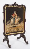 A Victorian carved mahogany cartouche-shaped firescreen:,