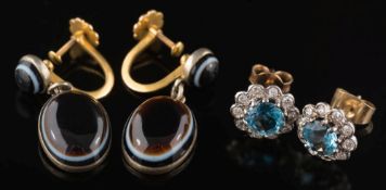 A pair of aquamarine and diamond circular cluster ear-studs: each with a central round aquamarine