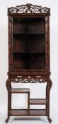 A Chinese carved hardwood simulated bamboo upright display cabinet on stand:,