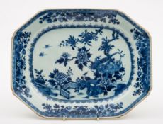 A Chinese blue and white octagonal dish: painted with peonies, rockwork, birds and a lattice fence,