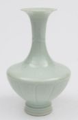 A Chinese pale celadon vase: with slender neck and foliate rim,